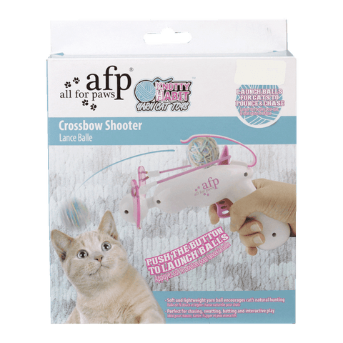 Compact crossbow cat toy with launching balls for active cats