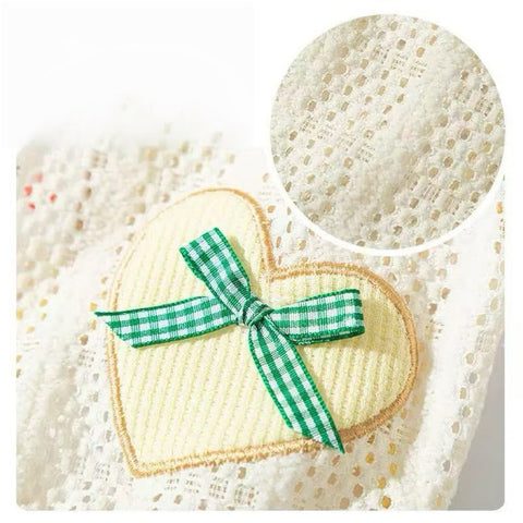 Close up image of the bow on heart of Heart Bow Summer Pet Sweater - Pets Villa.
