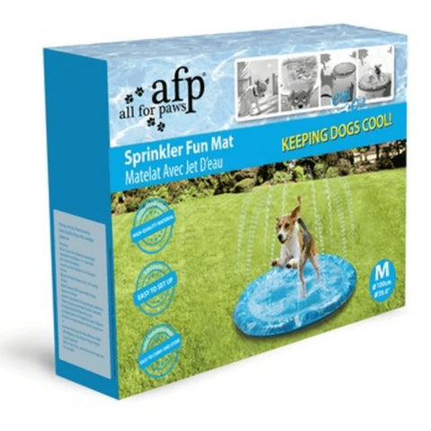 Dog splash pad spraying water from edges, connected to garden hose