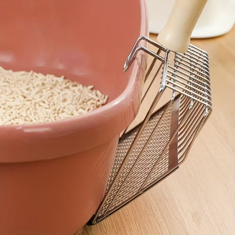 Image of 2 in 1 Metal Litter Scoop on a litter tray - Pets Villa. 