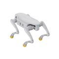 White robot dog with yellow wheels on a white background
