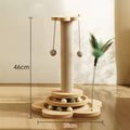Wooden cat toy with scratching post, balls, and feather toy on a light wooden floor._Pets Villa