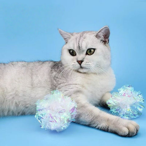 Image of a cat with Colourful Crinkle Paper Cat Ball - Pets Villa. 
