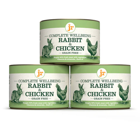 Image of the cans of JR Dog Complete Wellbeing Chicken & Rabbit 200g stacked - Pets Villa. 
