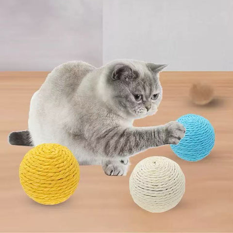 Image of a grey cat playing with Large Sisal Cat Ball Assorted - Pets Villa. 