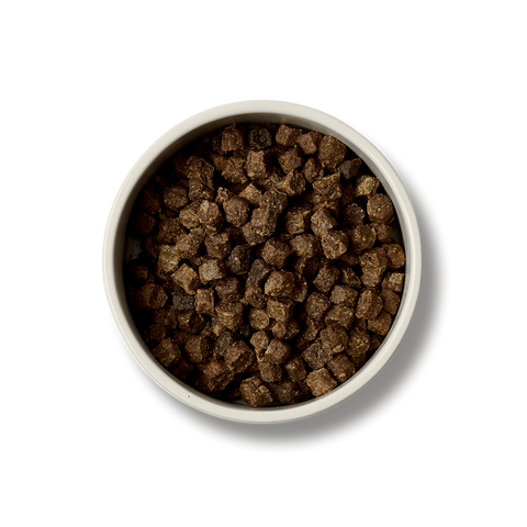 An image of a bowl full of MCADAMS Dog Complete Air Dried Free Range Wild Boar Dry Food - Pets Villa. 