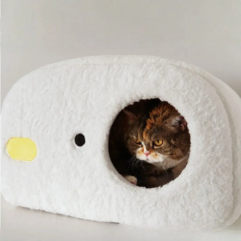 Image of a cat using PURROOM Chick Shaped Sleeping Pet Nest - Pets Villa. 