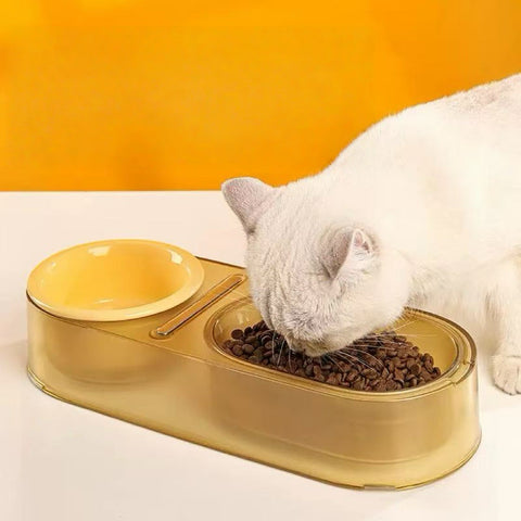 Image of a cat eating from SOFT ZOO Chubby Mixing Spoon and Bowl Set - Pets Villa. 