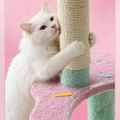 Close up image of a cat using the scratcher pole on Sprinkle Ice Cream Cat Tree - Pets Villa. 