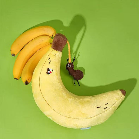 Close up next to a banana of ZEZE Softer Banana Pet Pillow - Pets Villa. 