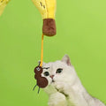 Close up image of cat swatting at ZEZE Softer Banana Pet Pillow - Pets Villa. 