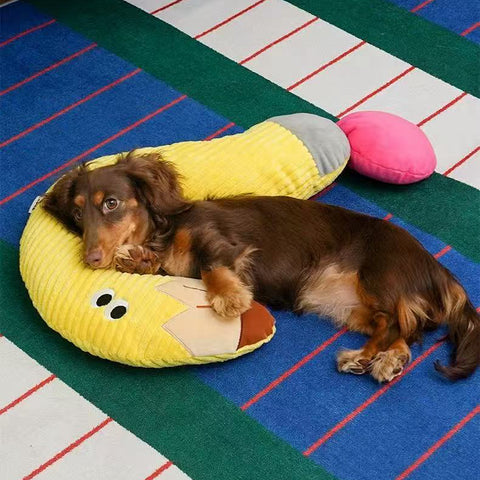 Image of a dog resting on ZEZE Softer Pencil Pet Pillow - Pets Villa. 