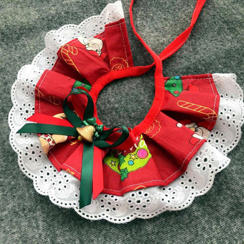 Christmas Pet Accessories - a variety of pet accessories suitable for dogs and cats. Green, red , white and black in colours. Includes a bell ornament. This is a product of Pets Villa.